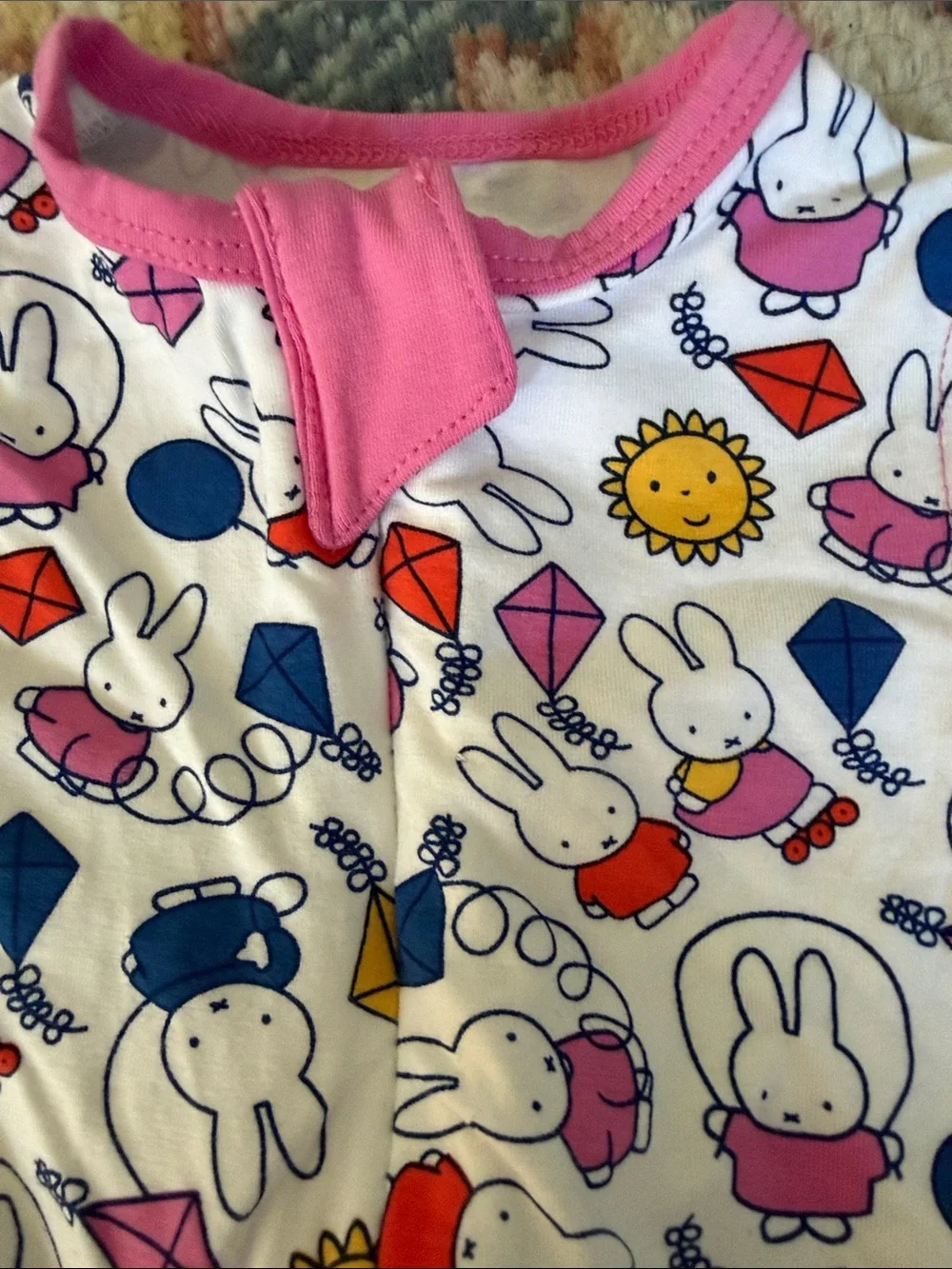 NWT new born Miffy Footed One-Piece ouncie with Pink Trim & vibrant bunny print